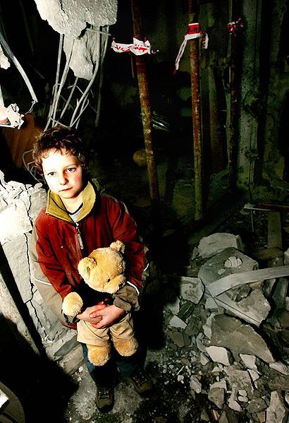 File:Little Israeli boy standing in his house that was destroyed by qassam rocket.jpg