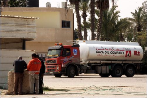 A Palestinian truck carrying fuel for the Gaza Strip enters Rafah town through the Kerem Shalom crossing between Israel and the southern Gaza Strip in March, 2014. Photo by Abed Rahim Khatib / Flash90